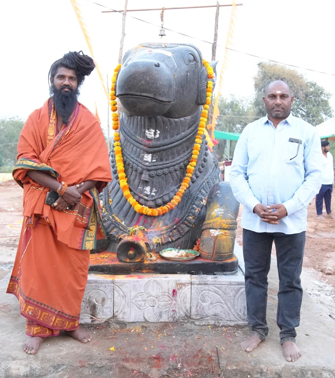 With large Nandi statue